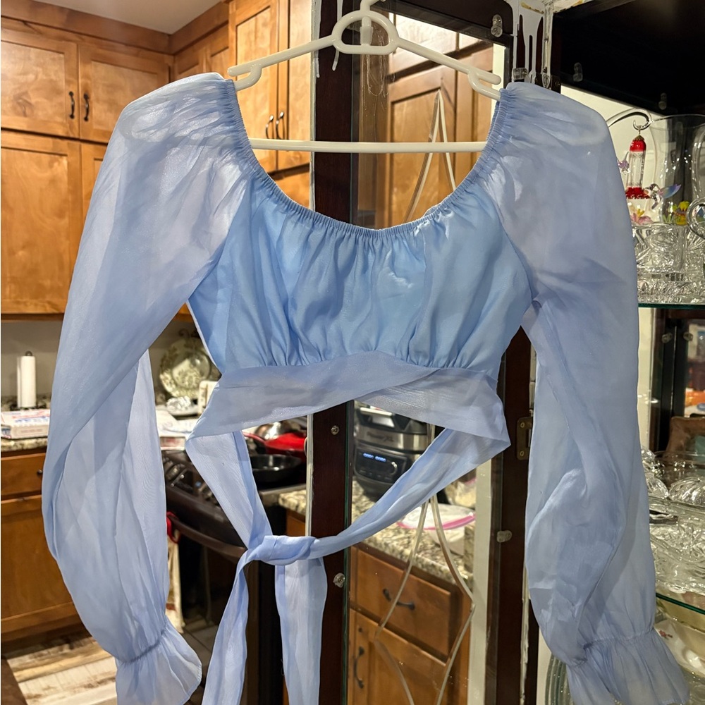 Size XS pastel blue midriff top by SHEIN has a tie back, super cute